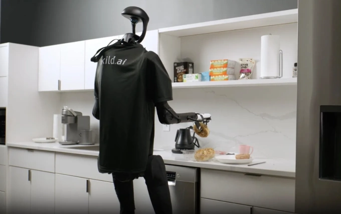 Robot hình người gắn bộ não do Skild AI phát triển tự pha cà phê và dọn bánh. Ảnh: Skild AI